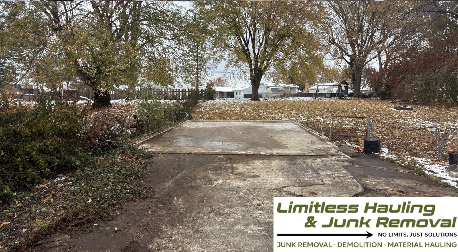 The same garage gone, leaving a swept concrete pad